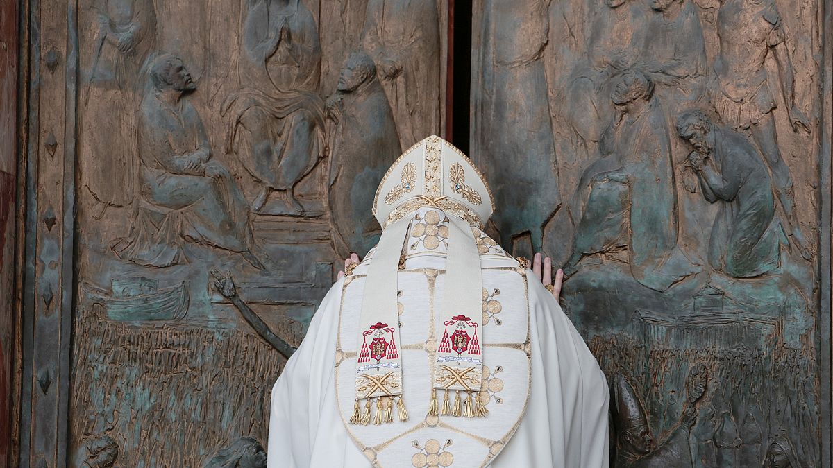 Cardinal James Michael Harvey opens the Holy Door of the Basilica of Saint Paul Outside the Walls, for the Jubilee, in Rome, 5 January 2025