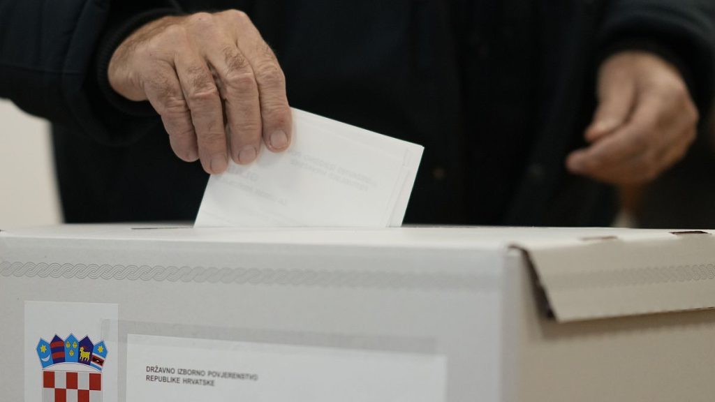 A man casts his ballot during the first round presidential election at a polling station in Zagreb, 29 December, 2024