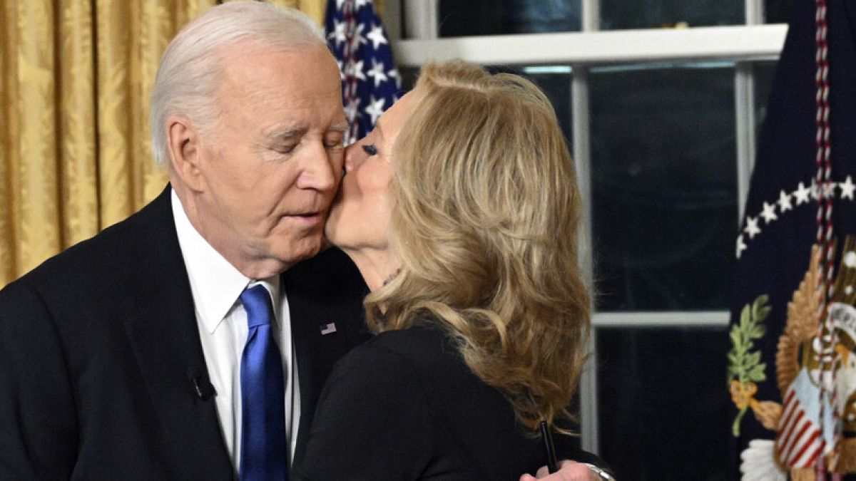 President Joe Biden hugs first lady Jill Biden after giving his farewell address from the Oval Office of the White House Wednesday, Jan. 15, 2025, in Washington