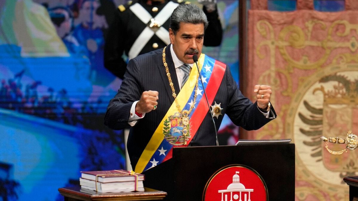 Venezuelan President Nicolas Maduro delivers his annual address before lawmakers and guests at the Teresa Carreno Theater in Caracas, Venezuela, Wednesday, Jan. 15, 2025.