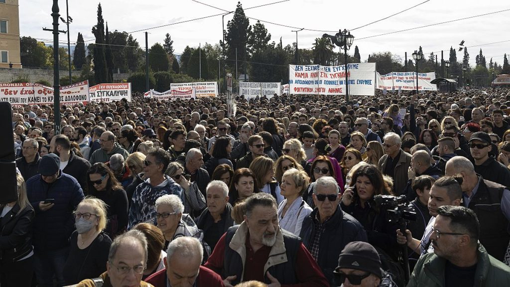 People attend a rally organised by the association of the families of victims of the Tempi train collision in Athens, 26 January, 2025