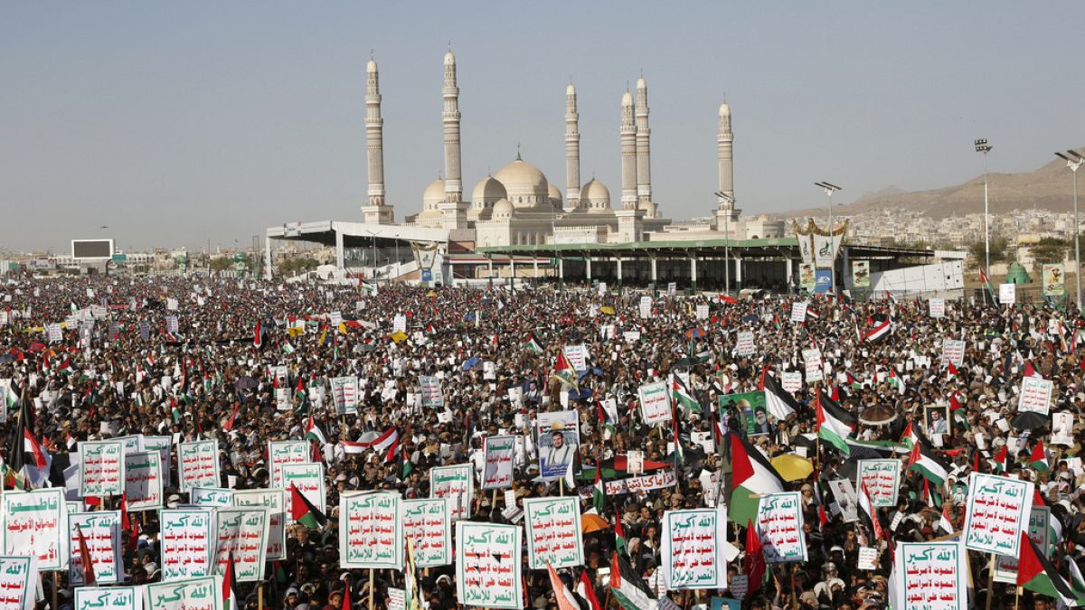 Houthi supporters attend a protest against the United States-led airstrikes on Friday, Jan 12, 2024, in Sanaa, Yemen.