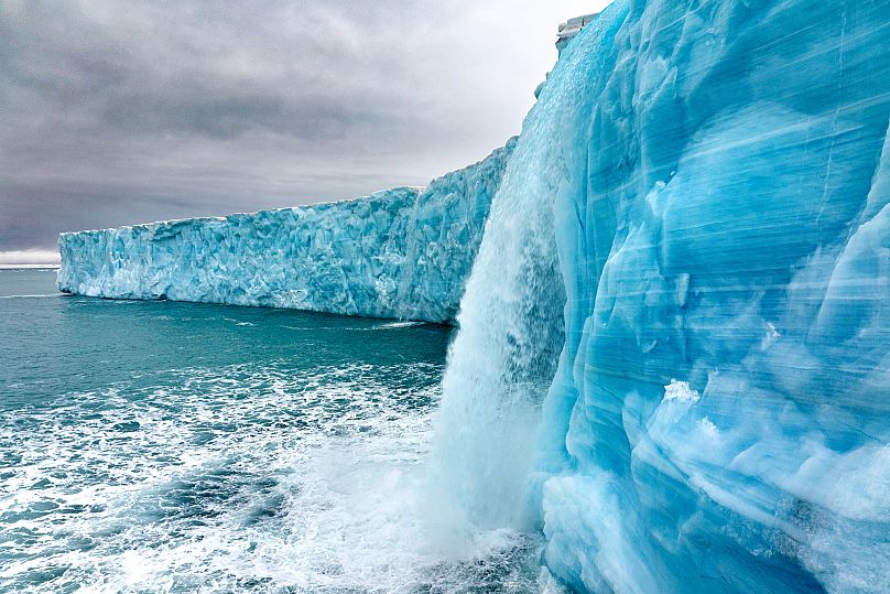 The rivers of meltwater cascading off a glacier in Svalbard are a stark reminder of the impacts of climate change.