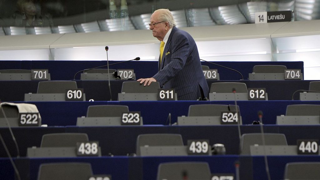 French former far right National Front leader Jean Marie Le Pen looks for his seat at the European Parliament, in Strasbourg, eastern France, July 1, 2014