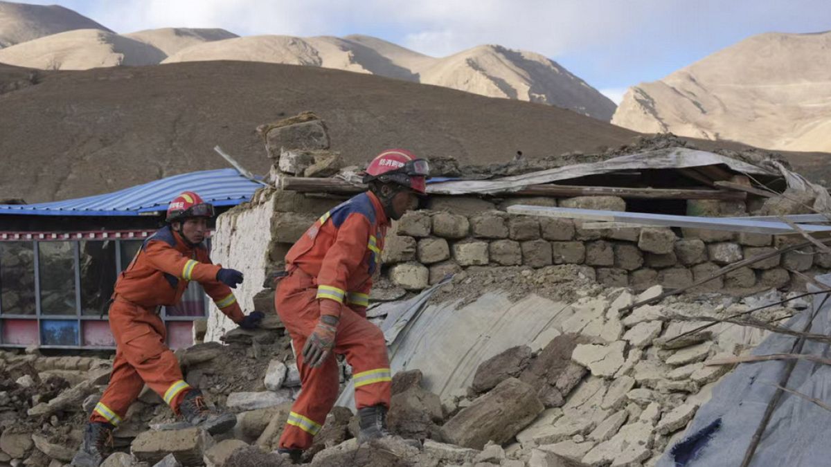 rescue workers conduct search and rescue for survivors in the aftermath of an earthquake in Changsuo Township of Dingri in Xigaze, southwestern China