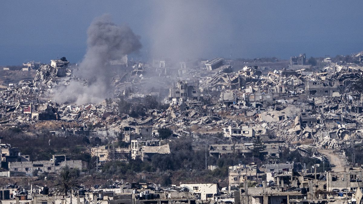 Smoke rises following an explosion in the Gaza Strip, as seen from southern Israel, Tuesday, Jan. 7, 2025.