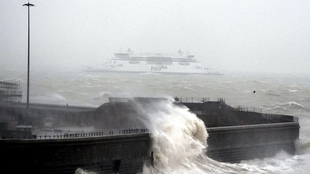 A ferry heads out to sea as weather warnings are enforced across parts of the UK, in Dover, England, Wednesday, Jan. 1, 2025