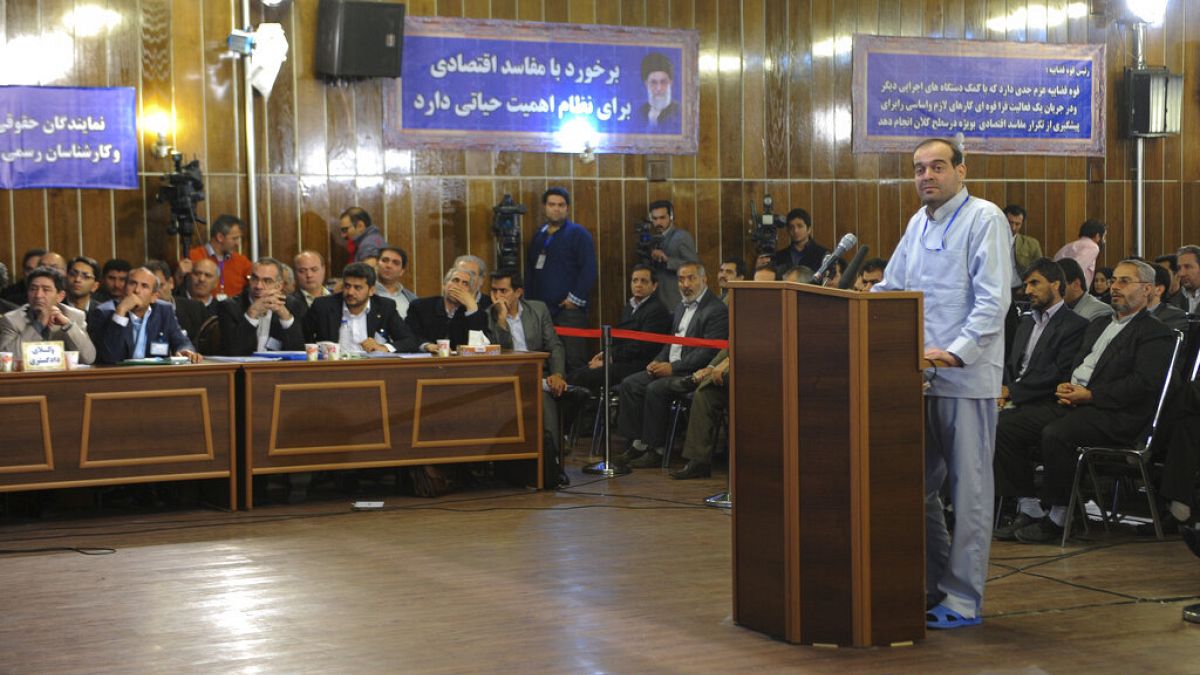 FILE - Feb. 18, 2012 photo, released by the Iranian Students News Agency, ISNA, Mahafarid Amir Khosravi speaks at his trial in a court in Tehran, Iran