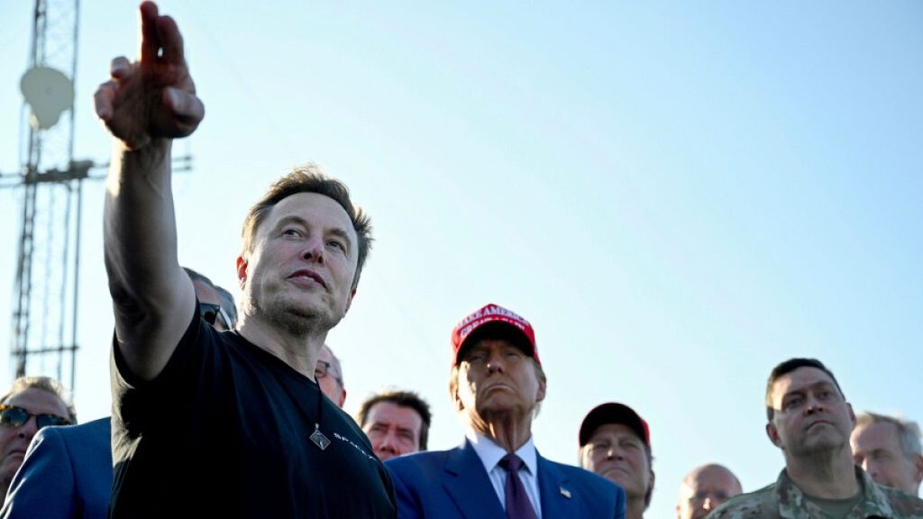 President-elect Donald Trump listens to Elon Musk at the launch of the sixth test flight of the SpaceX Starship rocket Tuesday, Nov. 19, 2024 in Boca Chica, Texas.