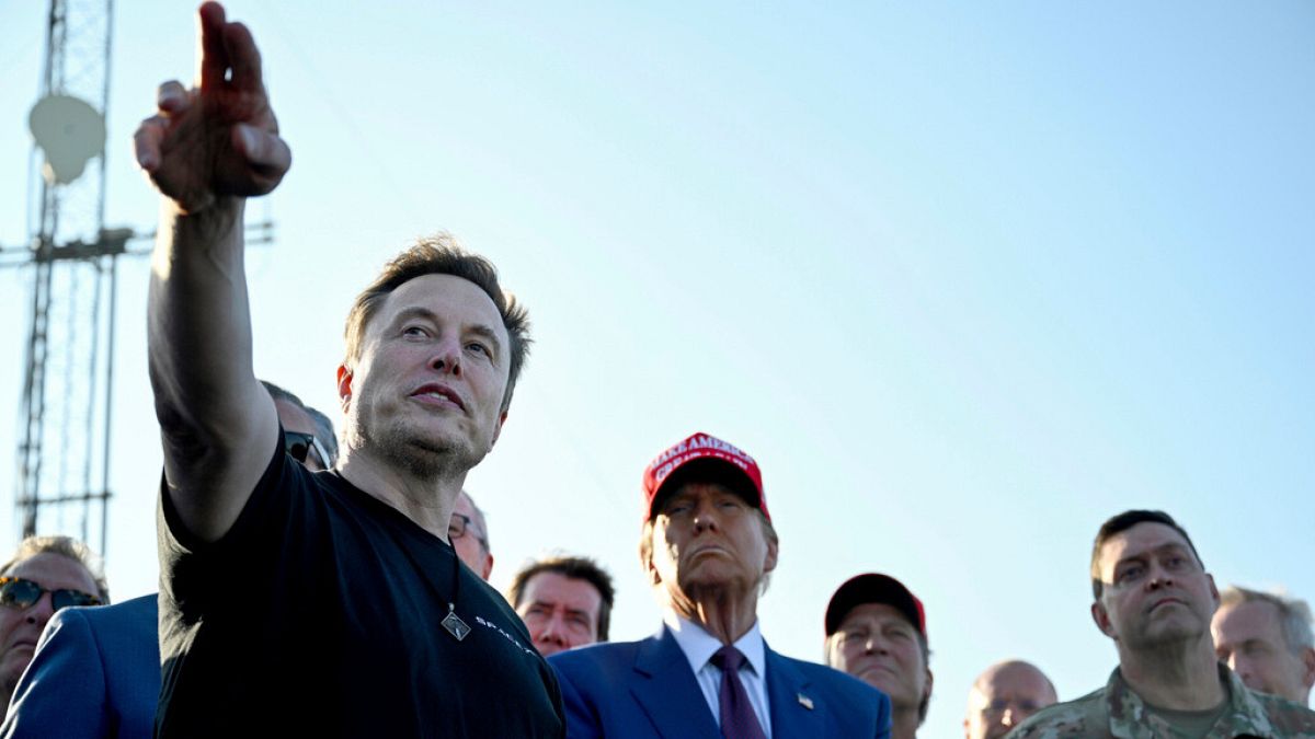 President-elect Donald Trump listens to Elon Musk at the launch of the sixth test flight of the SpaceX Starship rocket Tuesday, Nov. 19, 2024 in Boca Chica, Texas.