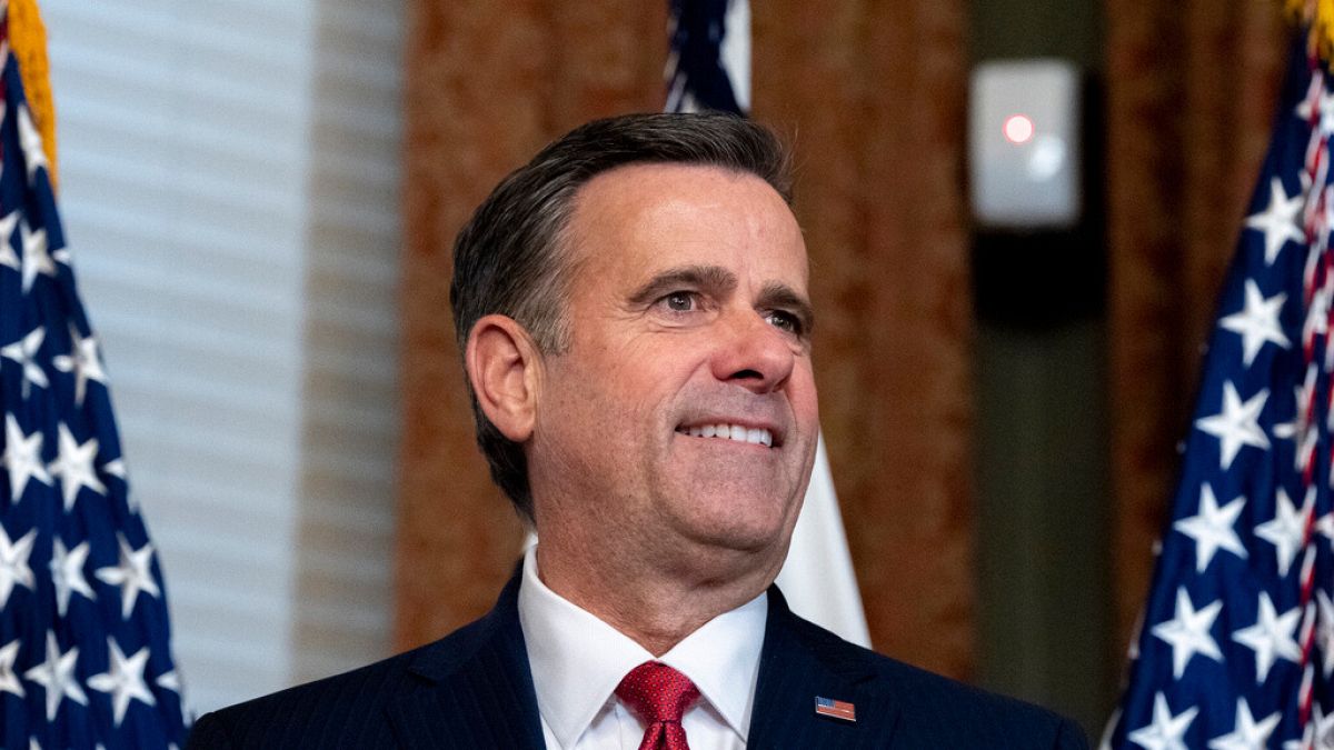 John Ratcliffe listens before Vice President JD Vance swears him in as CIA Director in the Vice Presidential ceremonial office in the Eisenhower Executive Office Building.