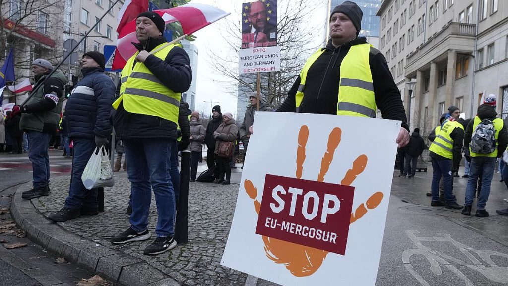 Polish farmers protesting against the EU-Mercosur deal outside the European Commission representation office in Warsaw.