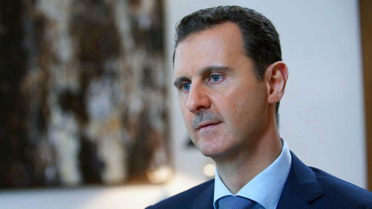 FILE - Syrian President Bashar Assad is pictured speaking during an interview with the Iran