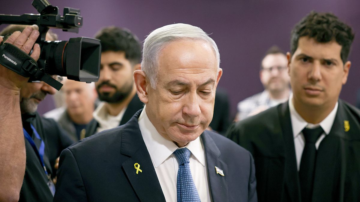 FILE: Israeli Prime Minister Benjamin Netanyahu attends his trial on corruption charges at the district court in Tel Aviv, 16 December 2024