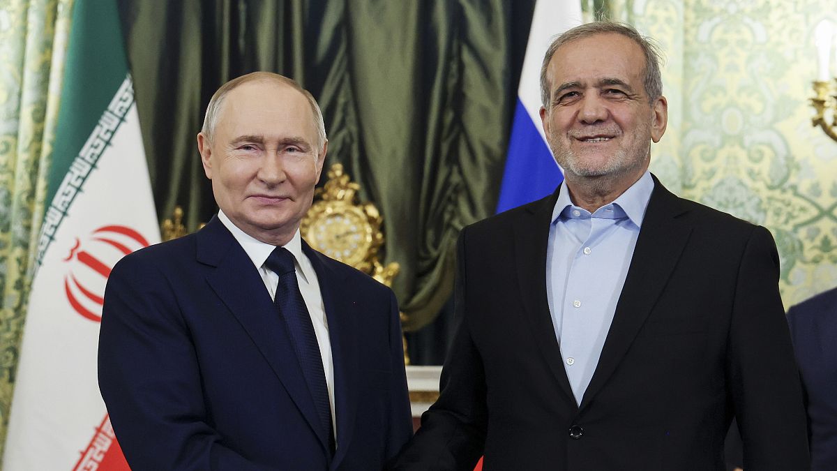 Russian President Vladimir Putin and Iranian President Masoud Pezeshkian shake hands at the Kremlin in Moscow, Russia, on 17 January, 2025.