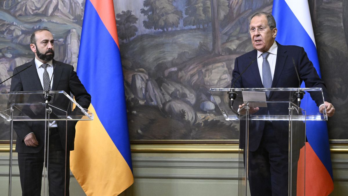 Russian Foreign Minister Sergey Lavrov, right, and Armenian Foreign Minister Ararat Mirzoyan hold a joint news conference following their meeting in Moscow, Russia, Tuesday, J