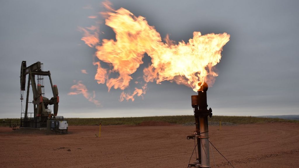 File picture of a flare burning natural gas at an oil well in Watford City, North Dakota, US