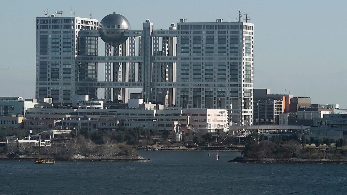 Japanese TV host and former pop star Masahiro Nakai retires after sexual assault report - pictured: Fuji Television headquarter building - Tokyo