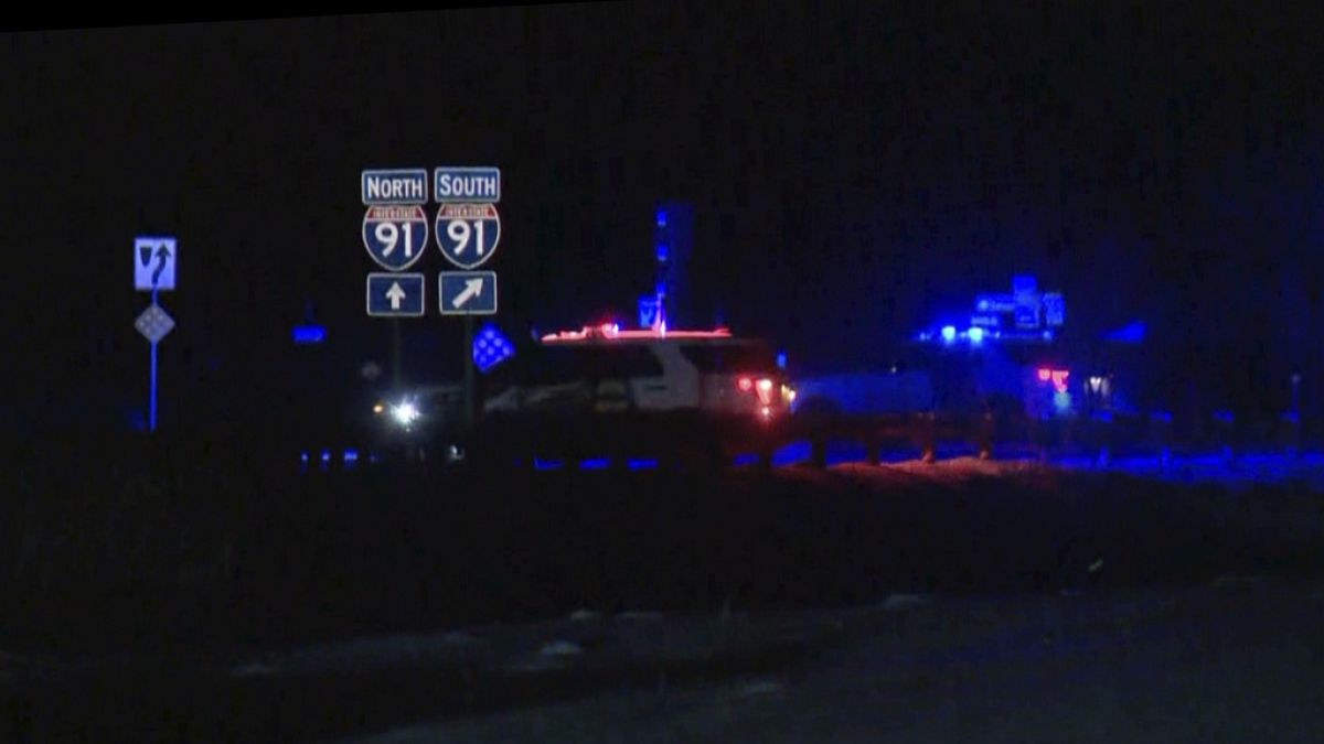 WCAX TV station video shows police cars closing off a road after a shooting involving a U.S. Border Patrol agent on Interstate 91 near Coventry, Vt., Monday, Jan. 20, 2025