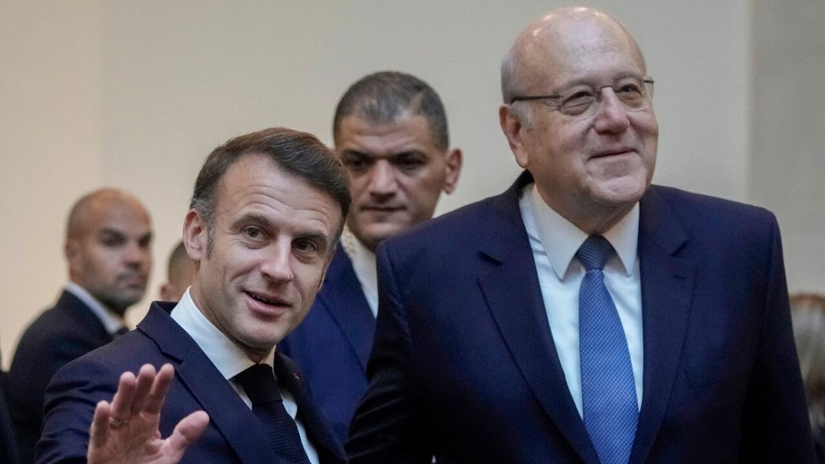 French President Emmanuel Macron after his meeting with Lebanese caretaker Prime Minister Najib Mikati, right, upon his arrival in Beirut, Friday, Jan. 17, 2025.