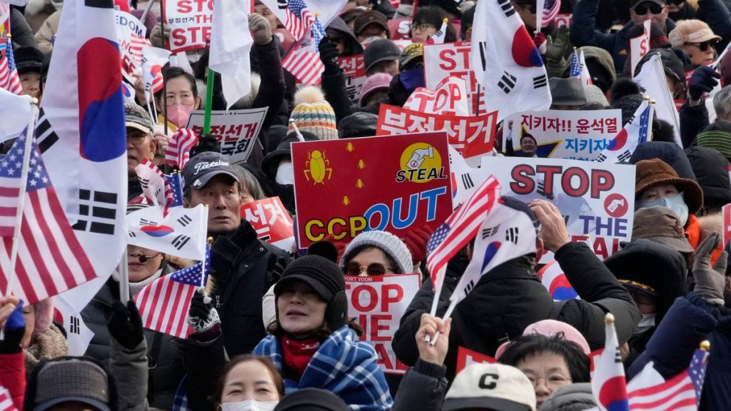 Supporters of impeached South Korean President Yoon Suk Yeol attend a rally to oppose his impeachment near the presidential residence in Seoul, South Korea, 8 Jan 2025.