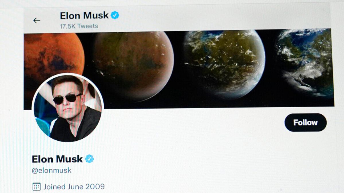 FILE - Part of the Twitter page of Elon Musk is seen on the screen of a computer in Sausalito, Calif., on Monday, April 25, 2022.