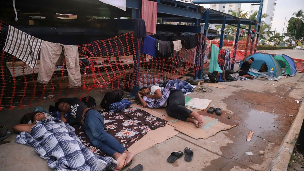 Migrants sleep on the side of a street in Acapulco, Mexico, Monday, 6 January 2025.