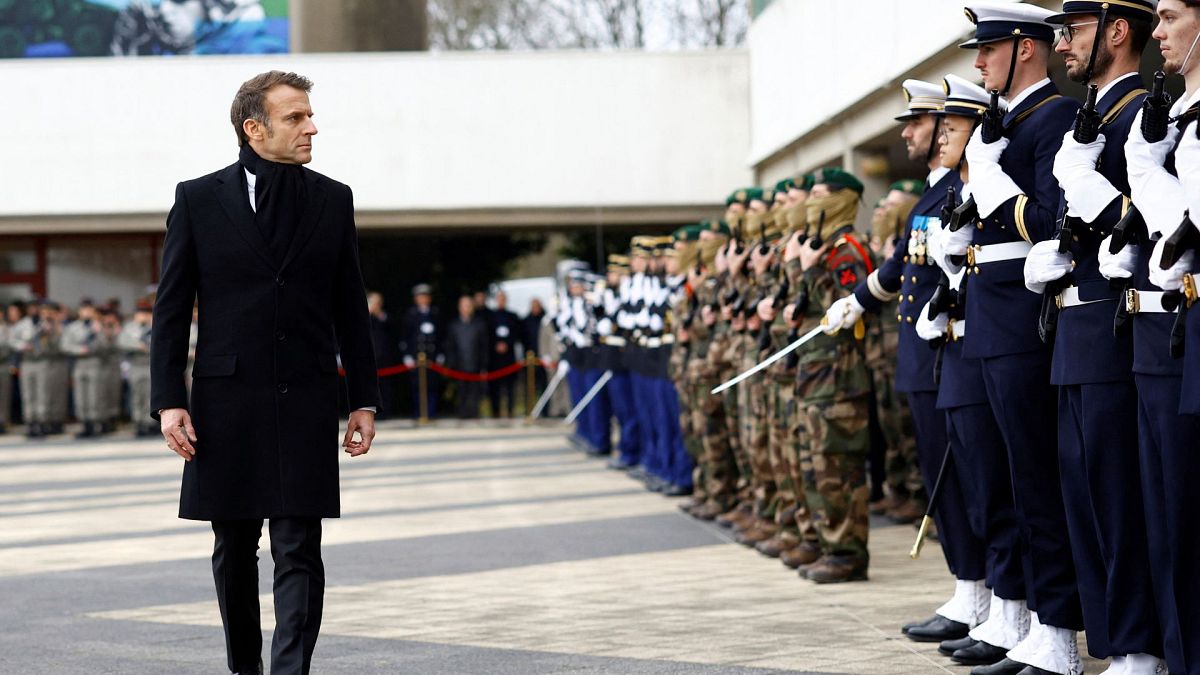 French President Emmanuel Macron reviews the troops during a military ceremony during a visit at the Digital Support and Cyber Command (CATNC) of the French Army, 20 Jan 2025.