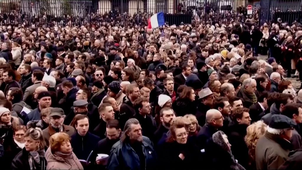 The onlookers outside of the church