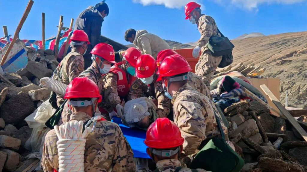 First responders perform rescue work at a village in Changsuo Township of Dingri County in Xigaze, southwest China