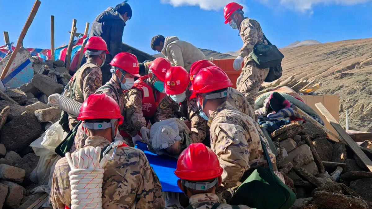 First responders perform rescue work at a village in Changsuo Township of Dingri County in Xigaze, southwest China