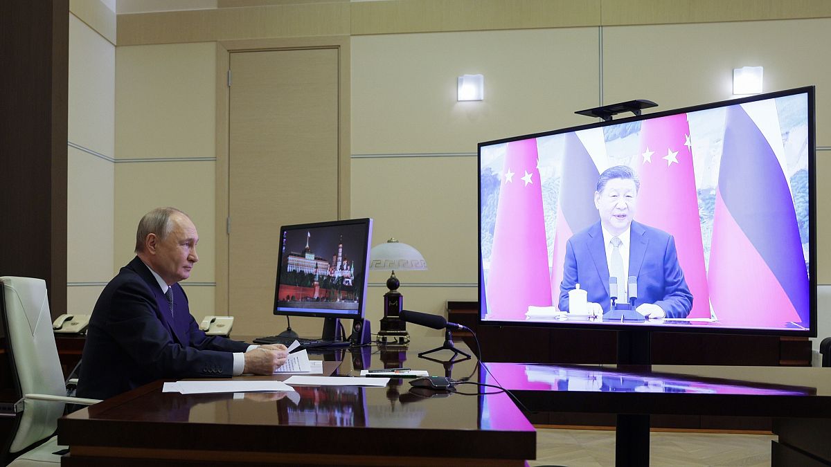 Russian President Vladimir Putin speaks with Chinese President Xi Jinping via videoconference at Novo-Ogaryovo state residence outside of Moscow, Russia, Jan. 21, 2025.