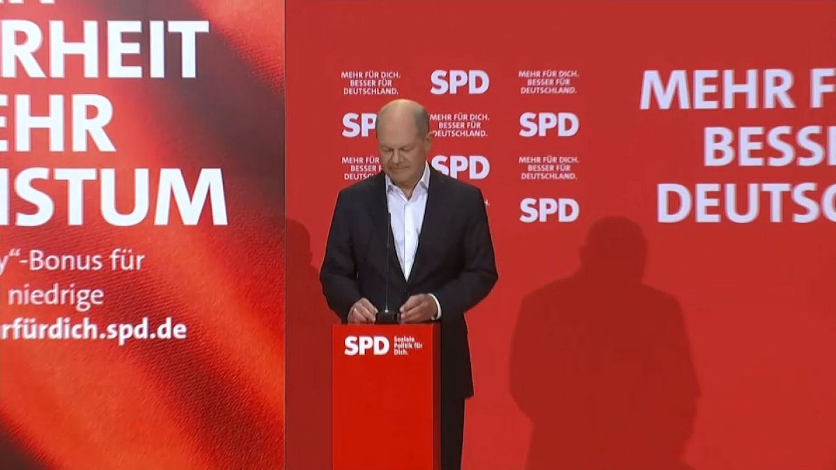 German Chancellor Olaf Scholz speaks at a press conference at the SDP HQ in Berlin, Sunday Jan. 5, 2025