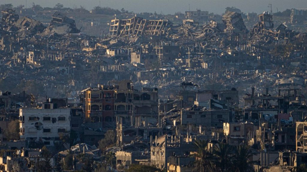 Destroyed buildings are seen inside the Gaza Strip from southern Israel, Monday, Jan. 13, 2025.