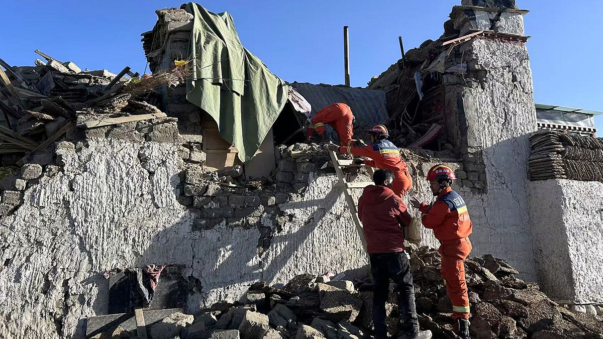 Rescue workers search for survivors in the aftermath of an earthquake in Changsuo Township of Dingri in Xigaze, on Tuesday, Jan. 7, 2025.