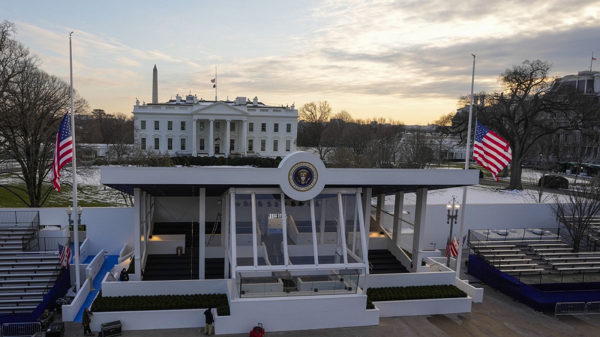 Workers continue with the finishing touches on the presidential reviewing stand by the White House Thursday, Jan 16 2025, ahead of President Trump inauguration