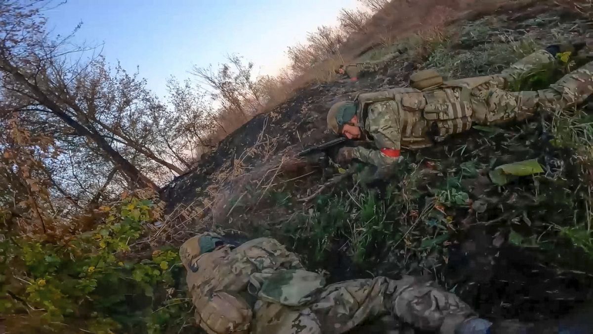 FILE - In this image from video released by the Russian Defense Ministry on Nov. 7, 2024, Russian Army soldiers fight with Ukrainian Armed forces in the Kursk region