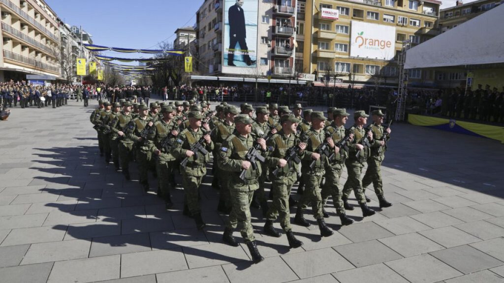 Kosovo Security Force members march in the centre of Pristina