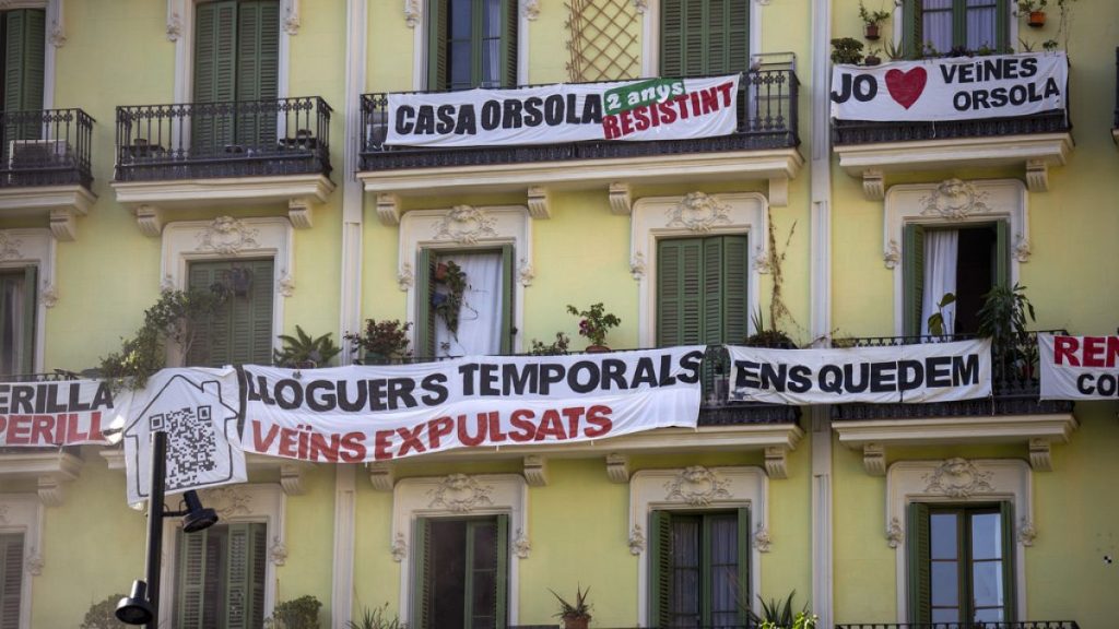 A block of flats, which is under threat of eviction, is photographed in downtown Barcelona, Spain, Wednesday, July 10, 2024.