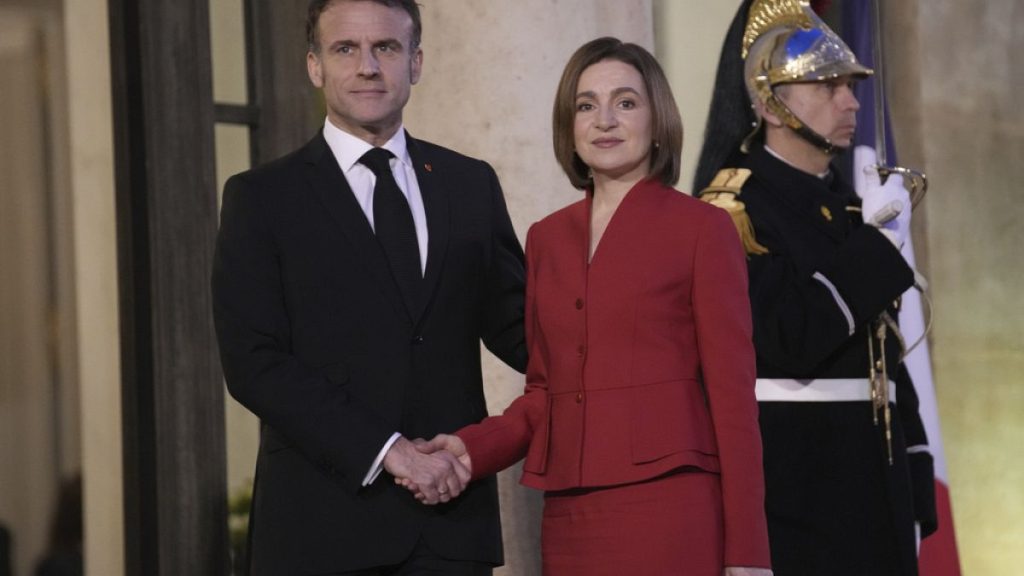 French President Emmanuel Macron welcomes Moldova