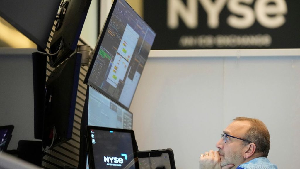 People work on the options floor at the New York Stock Exchange in New York, Tuesday, March 4, 2025.